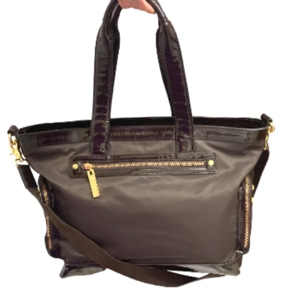 Tory Burch brown nylon and leather baby bag or travel bag tote shoulder strap